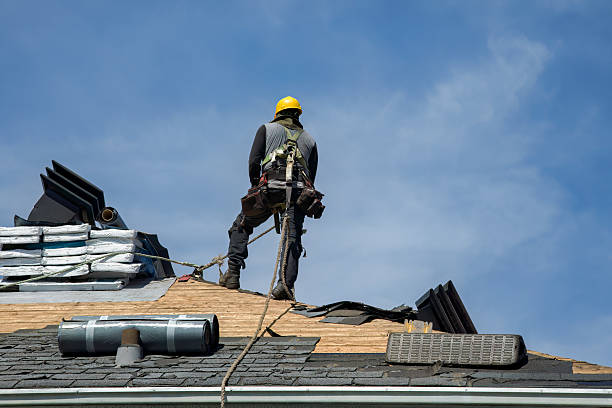 Professional Roof Replacement technician working in Peabody, MA